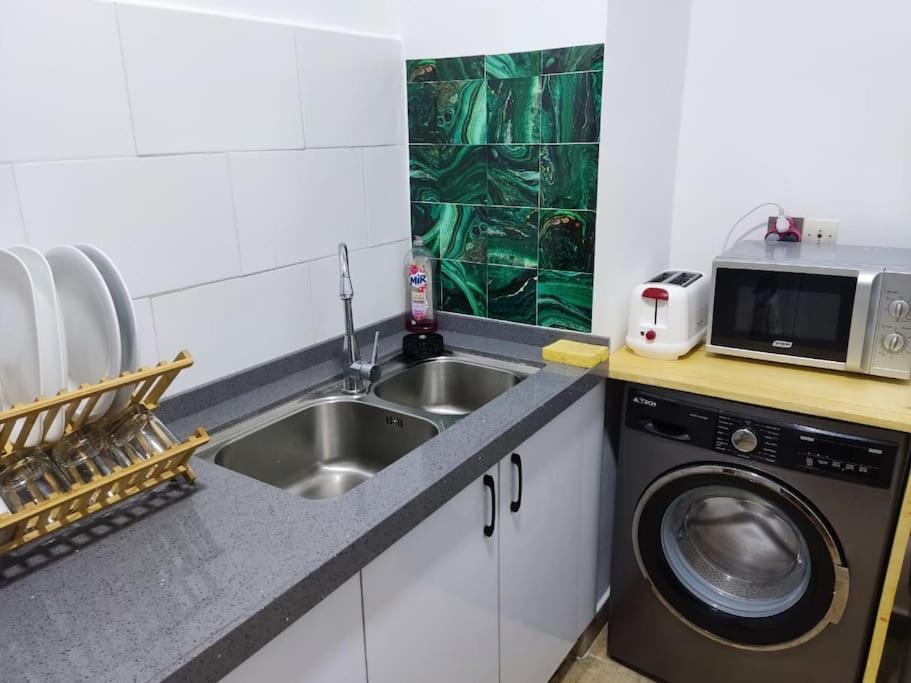 Superbe Appartement Avec Parking Gratuit Et Garde 达喀尔 外观 照片